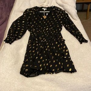 Black and gold polka dotted dress.